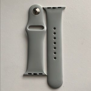Grey Apple Watch band.